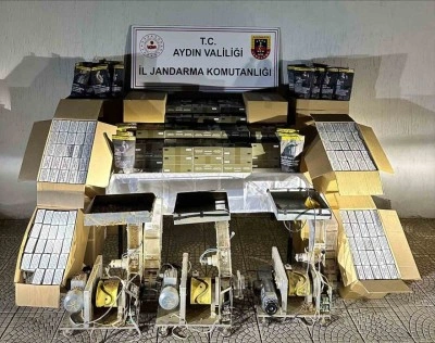 Halı yıkama d&uuml;kkanı g&ouml;r&uuml;n&uuml;ml&uuml; iş yerinde ka&ccedil;ak sigara imalatı