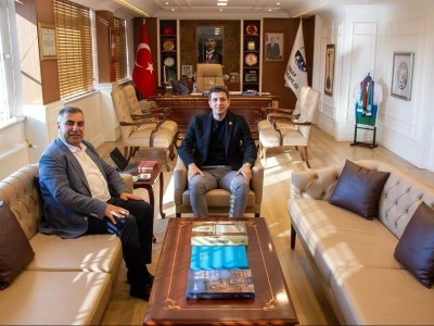 Kanaat Önderi İş İnsanı Arslan’dan Çınar Kaymakamı Erdoğan’a Ziyaret