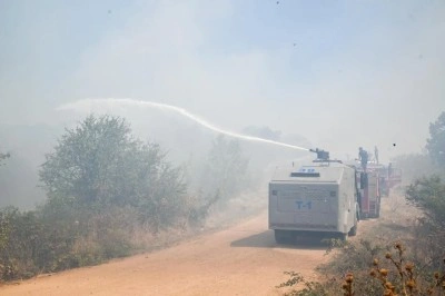 Ormanlık alana sıçrayan yangın büyümeden söndürüldü