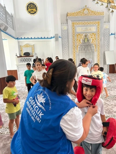 Kur&rsquo;an kurslarında "Merkezim Her Yerde" neşesi